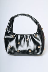 Borsa piccola a mezzaluna con borchie