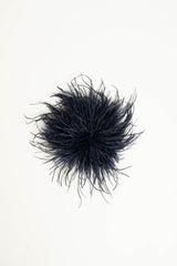 Spilla con piume blu