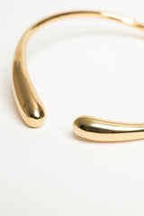 Collana rigida in metallo dorato