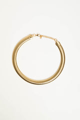 Collana rigida in metallo dorato