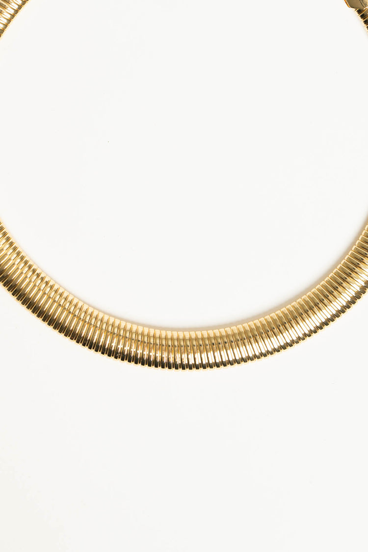 Collana rigida in metallo dorato