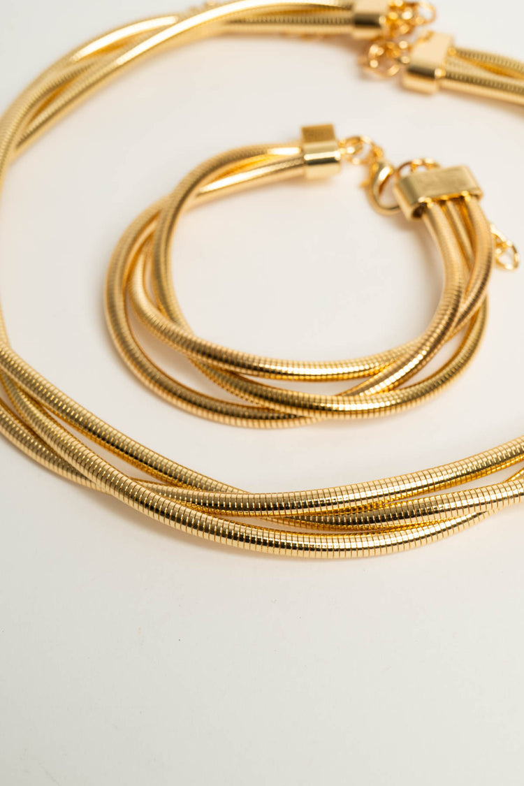 Set collana + bracciale a fili dorati