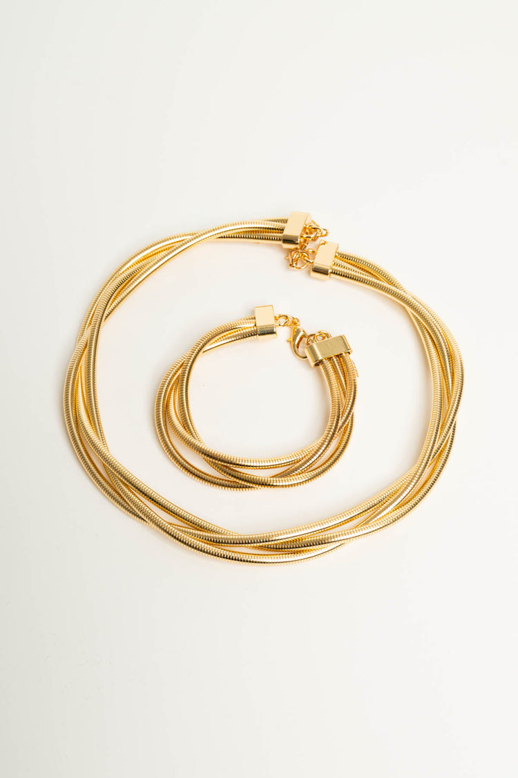 Set collana + bracciale a fili dorati