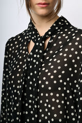 Blusa a stampa pois