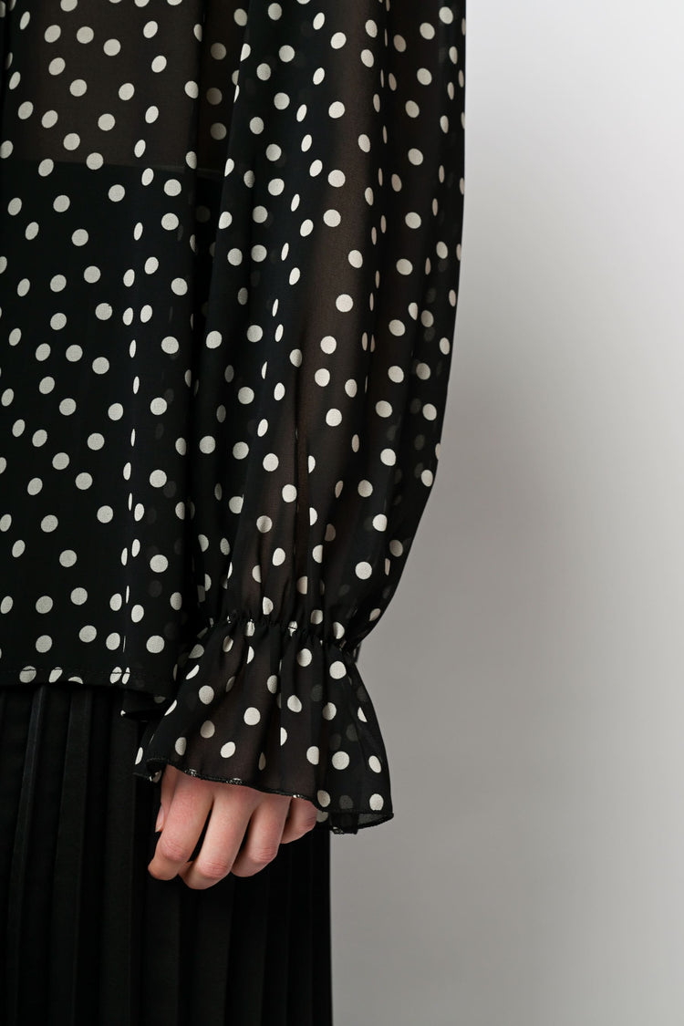 Blusa a stampa pois