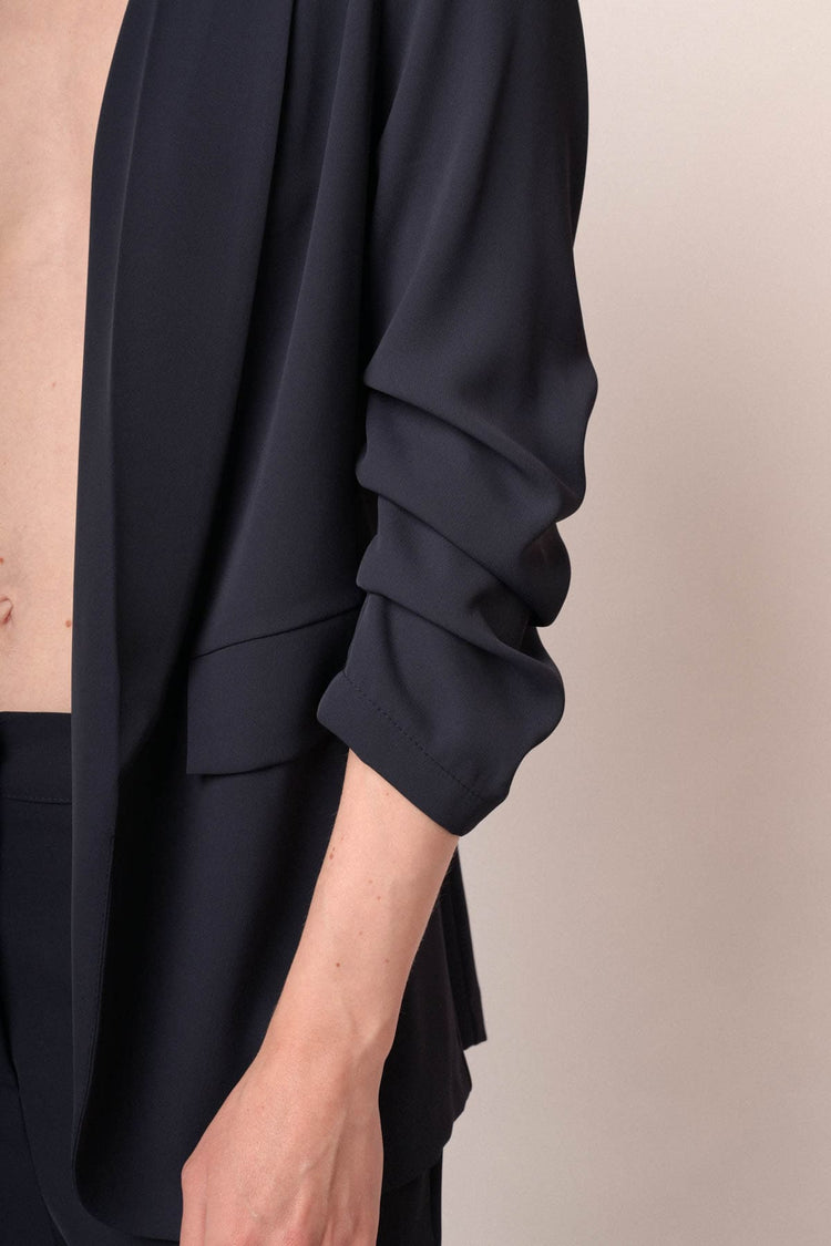 Giacca blu con maniche arricciate