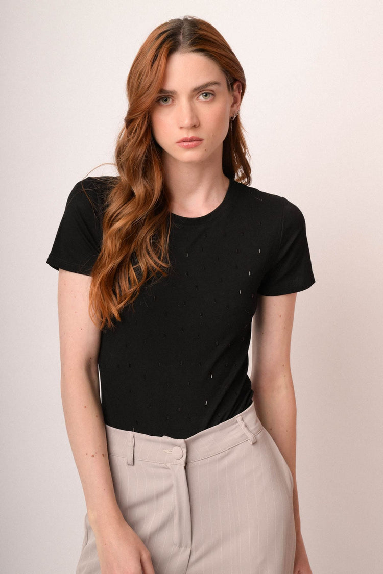 Pantaloni gessati beige a gamba svasata