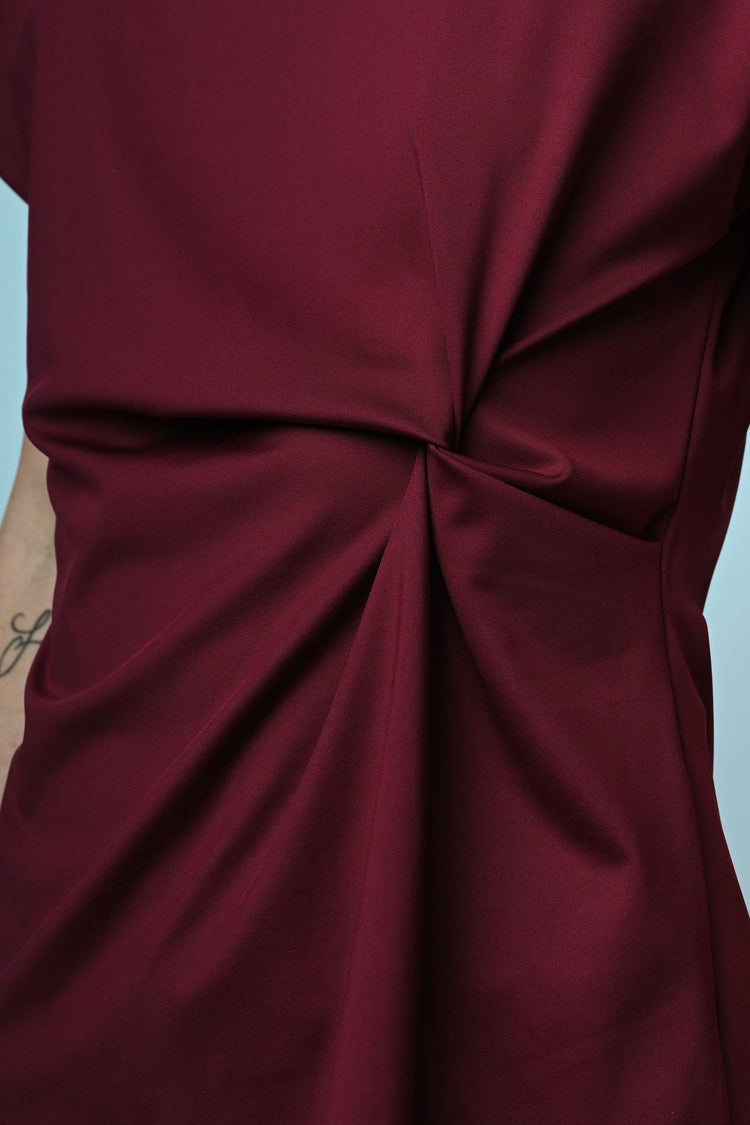 Top con drappeggio laterale