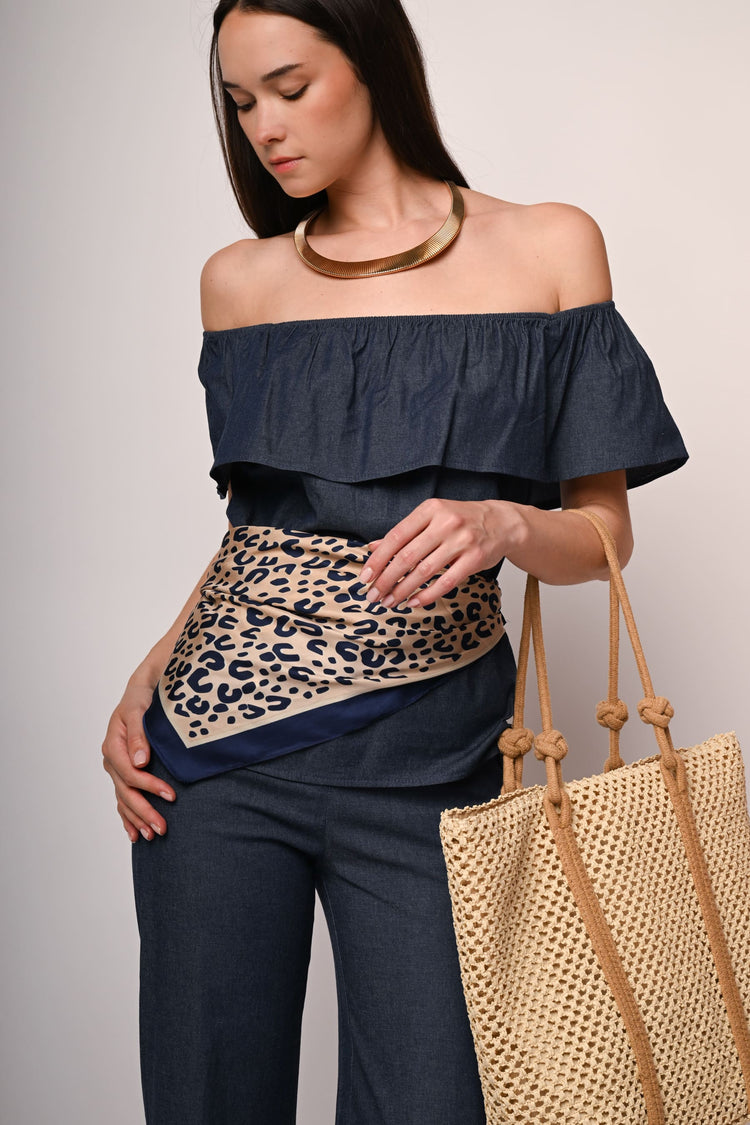 Top in denim con volant