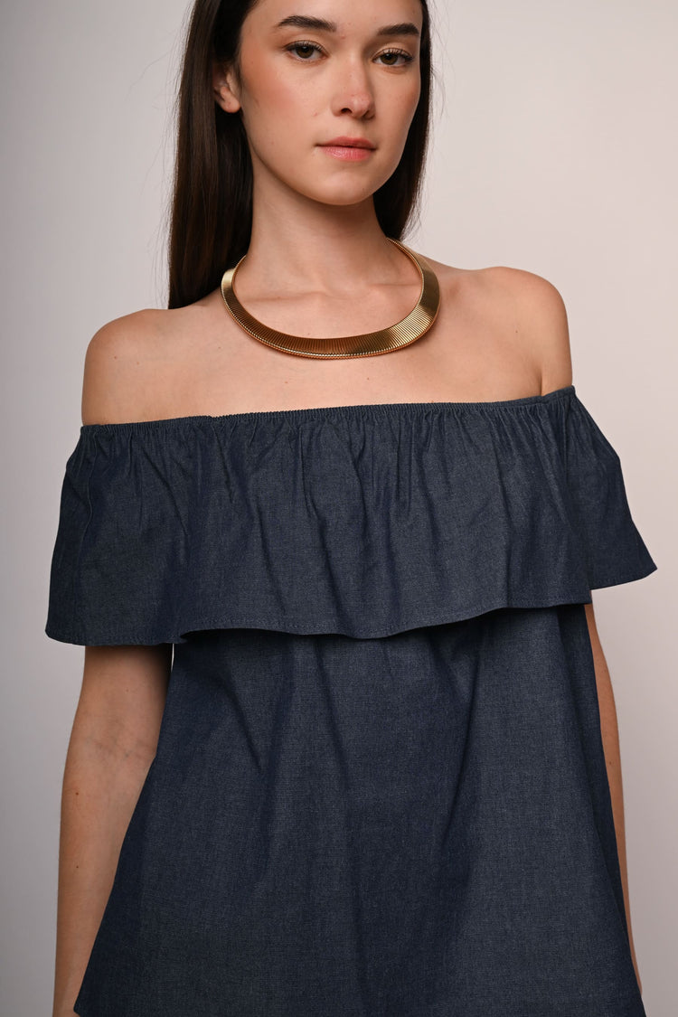 Top in denim con volant