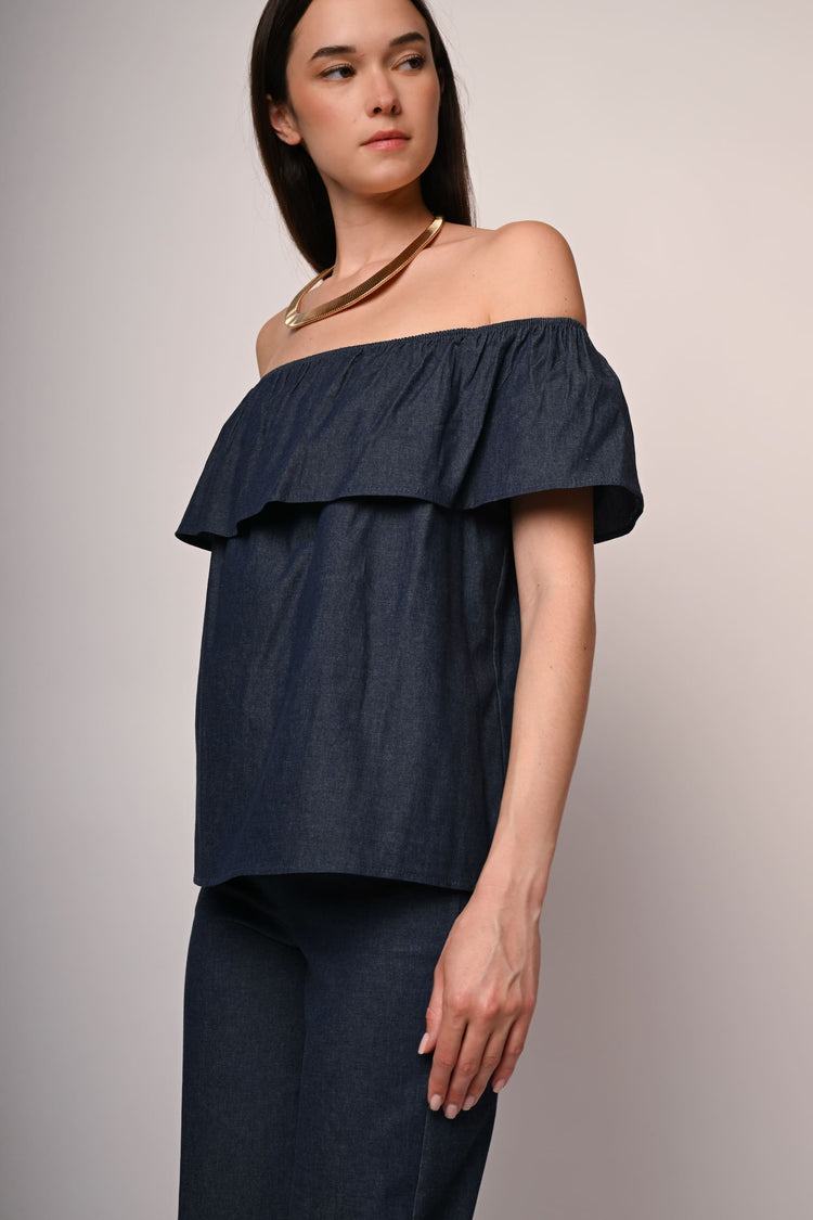 Top in denim con volant